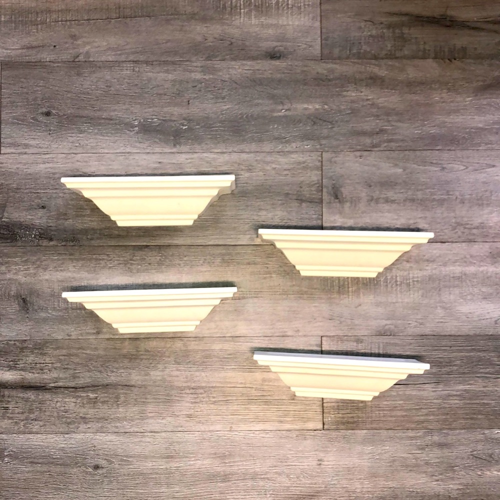 Four all white shelves  with some light little scratches